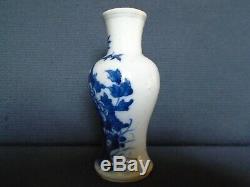 A Chinese porcelain pos. Kangxi u/g blue small Vase, 13.5cms. High, slight damage