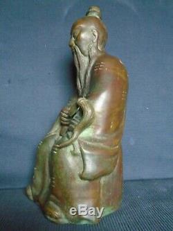 A good Chinese Ming bronze figure of the Immortal'Lu Dogbin'. 30cm. High, signed