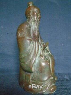 A good Chinese Ming bronze figure of the Immortal'Lu Dogbin'. 30cm. High, signed