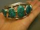 High grade turquoise sterling silver bracelet 1 1/2 tall 107 gr signed C. CHAMA