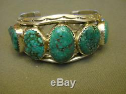 High grade turquoise sterling silver bracelet 1 1/2 tall 107 gr signed C. CHAMA