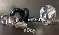 MONIES, EBONY and LUCITE EARRINGS. Signed, HIGH FASHION. NEW
