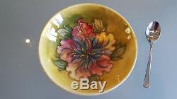 MOORCROFT ORCHID FLORAL BOWL. SIGNED TO BASE. 5cm HIGH X 14cm ACROSS THE TOP. A1