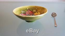 MOORCROFT ORCHID FLORAL BOWL. SIGNED TO BASE. 5cm HIGH X 14cm ACROSS THE TOP. A1