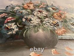 Pair of highly textured floral still life paintings, signed by K. Stone