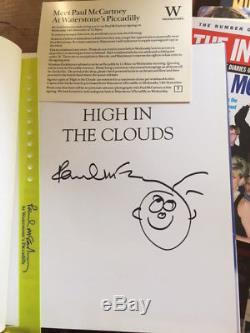 Paul McCartney Signed HIGH IN THE CLOUDS with original Doodle and wristband